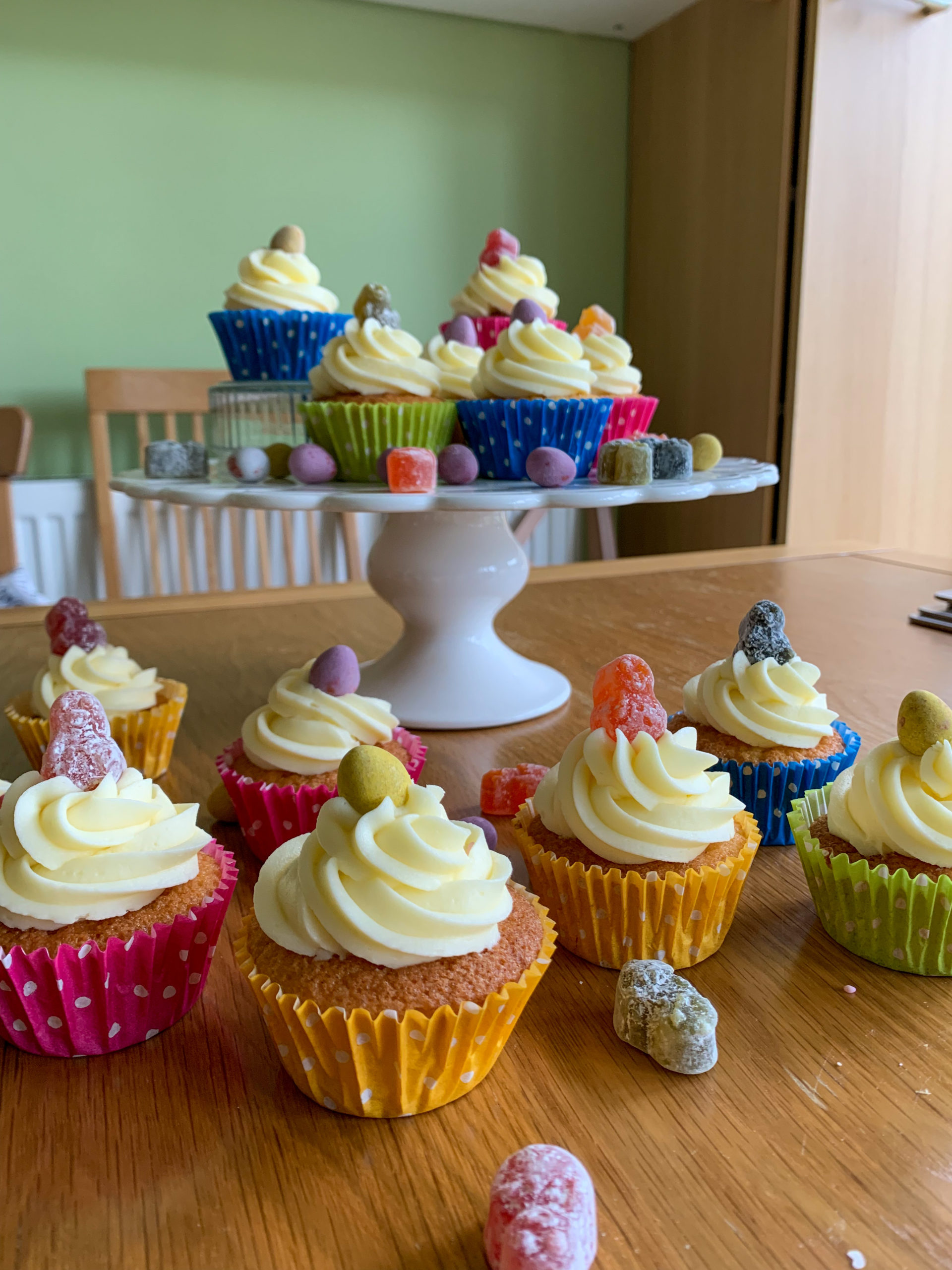 Cupcakes on a table and cake stand
