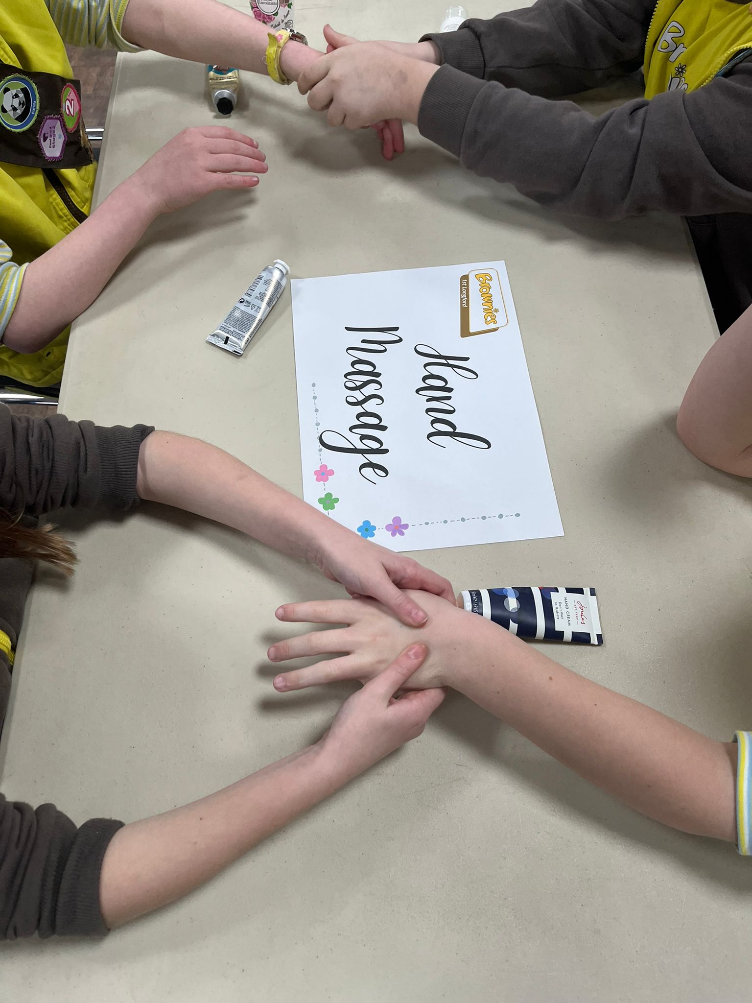 Brownies giving each other hand massage